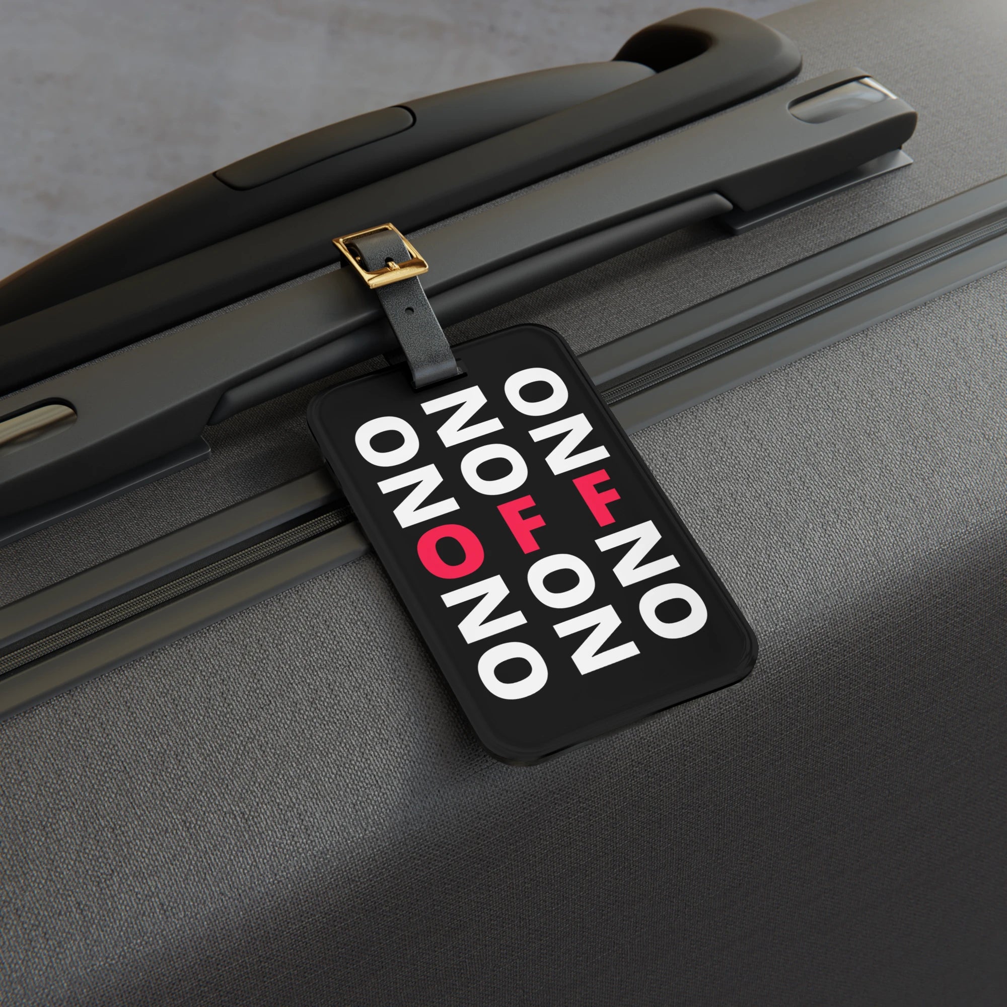 LE SOBOL ON OFF Flight Mode Tag on grey suitcase